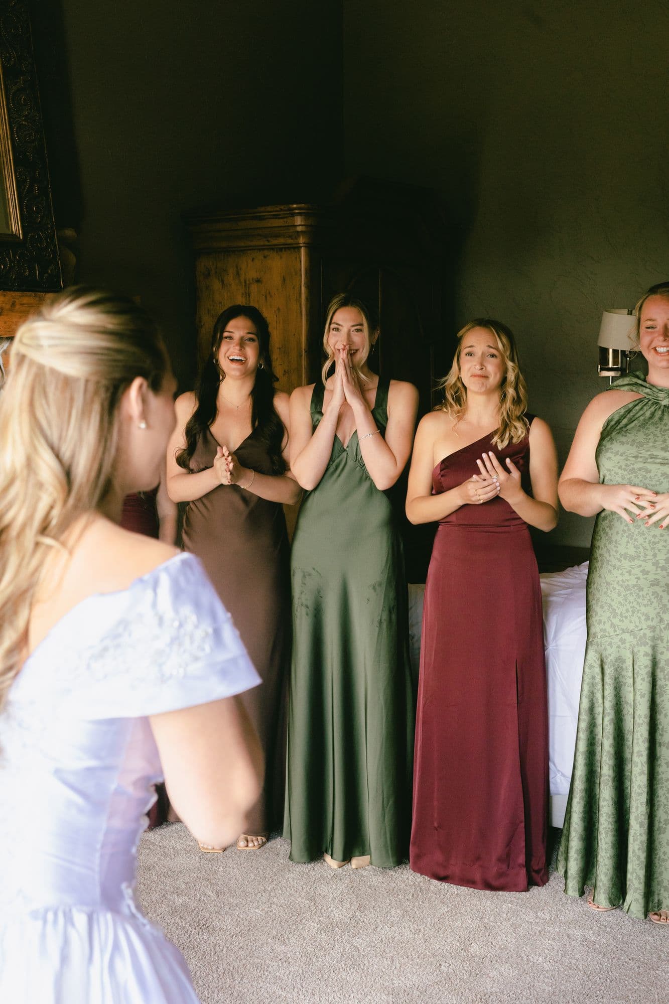 Marita’s bridesmaids reacting to seeing her in her wedding gown for the first time