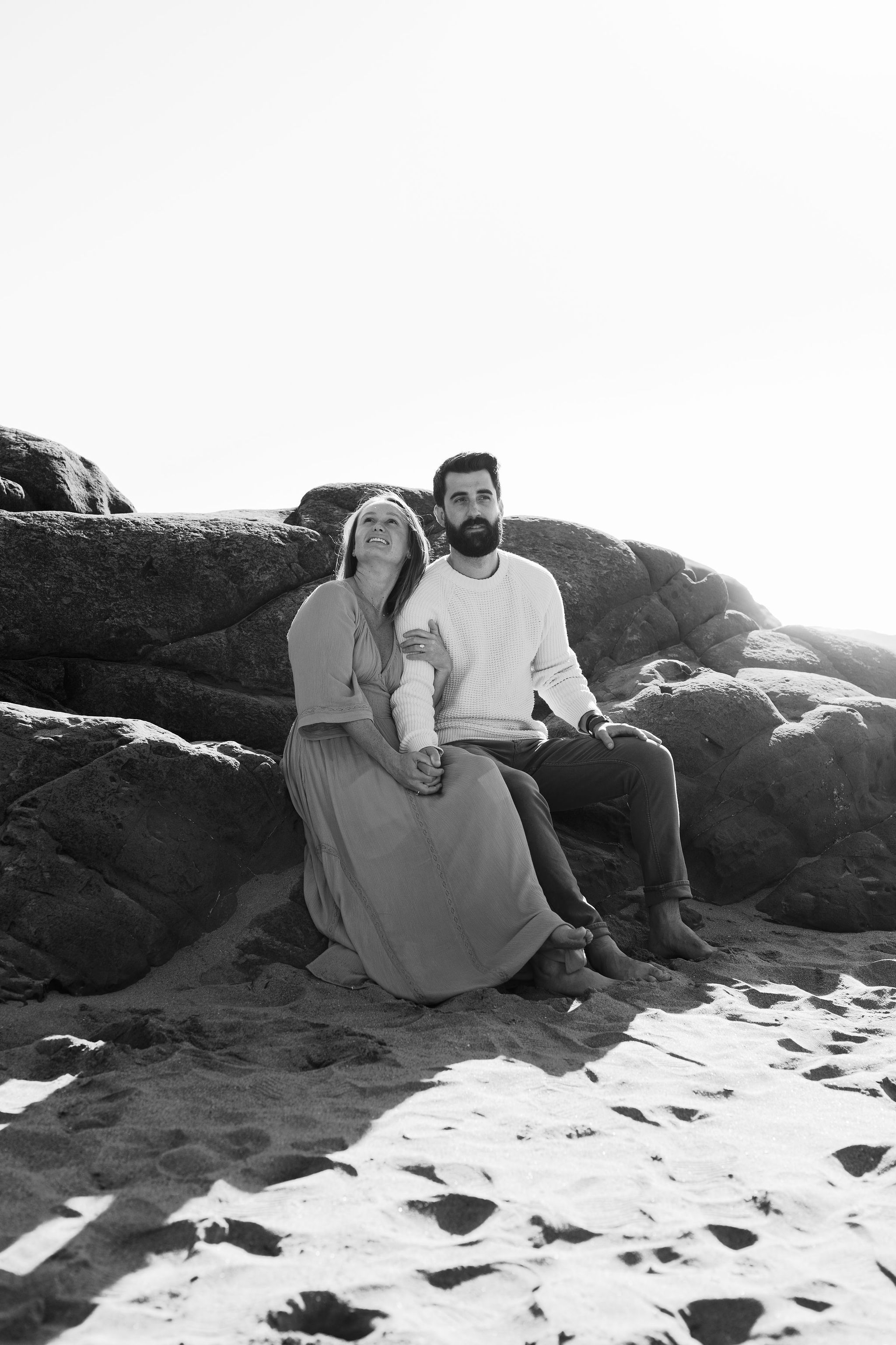 Black and white portrait of a couple seated together, editorial wedding photography by Christopher Cook
